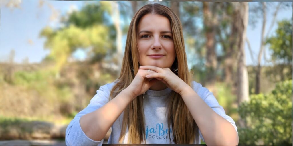 Unlock Emotional Safety in Relationships with Vanja Beric Couples Counselling Vanja Beric, a counselor, sitting outdoors with a calm expression, symbolizing emotional connection and trust in relationships.