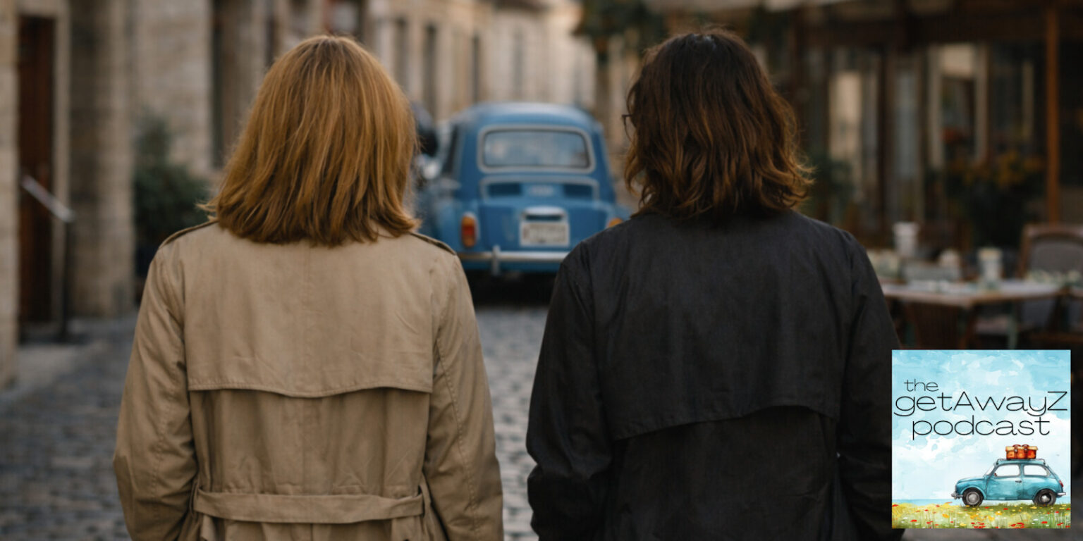 Two people walk through a charming European street, embodying The getAwayZ’s focus on real-life, immersive travel experiences.