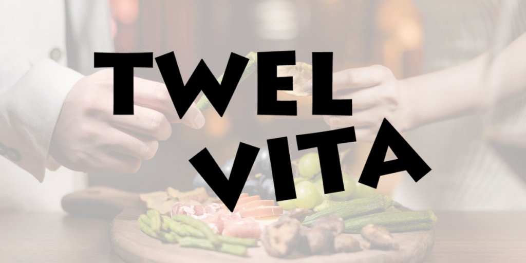 Twelvita: Healthy Snacks That Focus on Natural Ingredients Twelvita snacks shared between two people, featuring fresh vegetables and meats on a wooden platter.