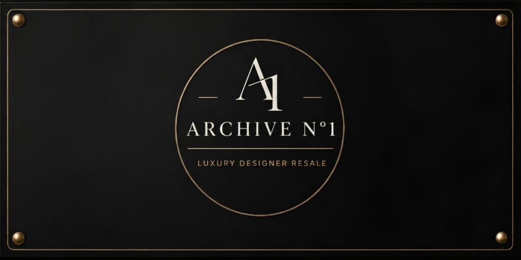 A black sign features a gold-bordered circle with "A1 ARCHIVE N°1" inside, and "Luxury Designer Resale" below, conveying elegance and exclusivity.
