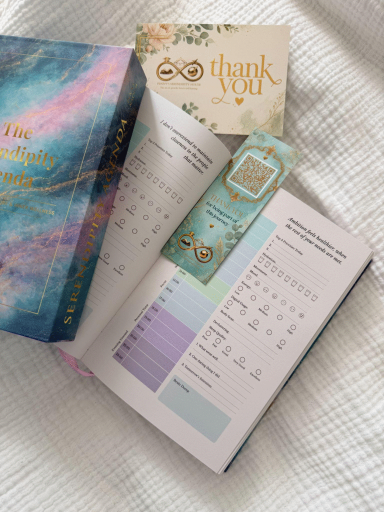 Open Serendipity Agenda showing daily wellbeing trackers with branded bookmark and thank-you card.
